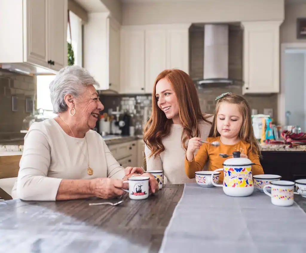Stage-An-elderly-woman-is-sitting-in-her-kitchen-1024x849.jpg
